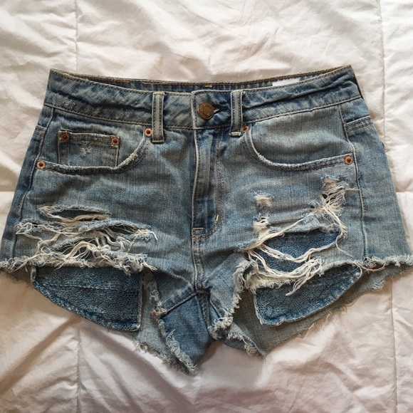 tattered denim shorts